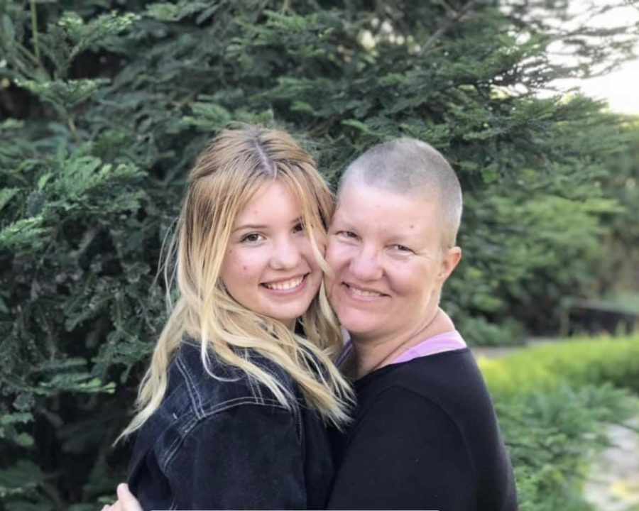 Caire (left) and Amy Geriak (right) celebrate Claires 17th birthday party shortly after Amy finished chemotherapy treatment on June 12, 2020 in Los Alamos, Calif.