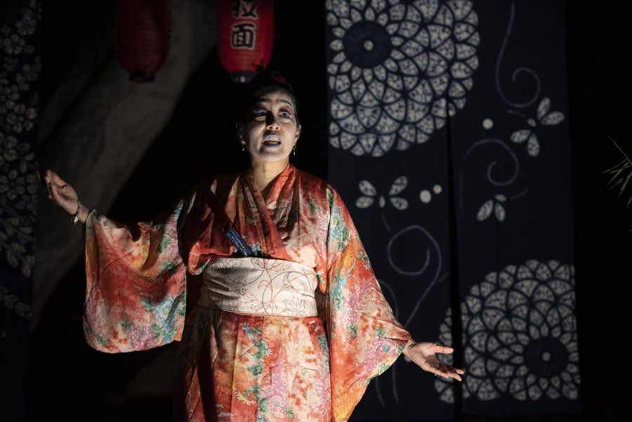 Yuko Matsumura (Deborah Cristobal) mourns the loss of her husband as audiences gather around her on Oct. 13 in Santa Barbara, Calif. The melancholic performance immersed audiences into the struggles of a first-generation Japanese immigrant making her way in a new world.