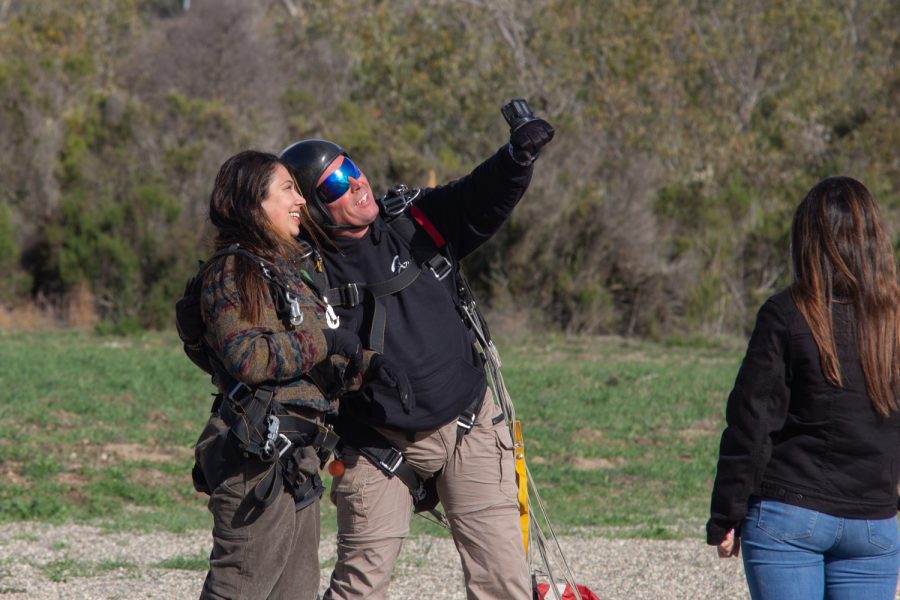 From left, Paula Bran and Instructor Tom Pecharich, have just completed Bran’s first skydive on Dec. 5 at Skydive Santa Barbara in Lompoc, Calif. Bran came with two of her friends who also jumped.