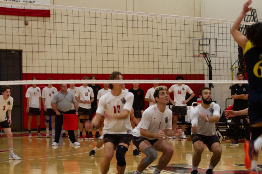 From left, Troy Fitzgerald, Cole Richards, and Milton Haliniak wind up for a three person block against Fullertons middle blocker in the Sports Pavillion at City College in Santa Barbara, Calif.