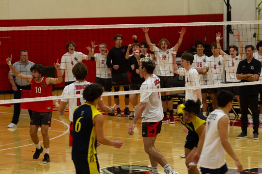 The vaqueros mens volleyball team celebrates a block in the Sports Pavillion at City College in Santa Barbara, Calif. The team had 19 blocks total this game.