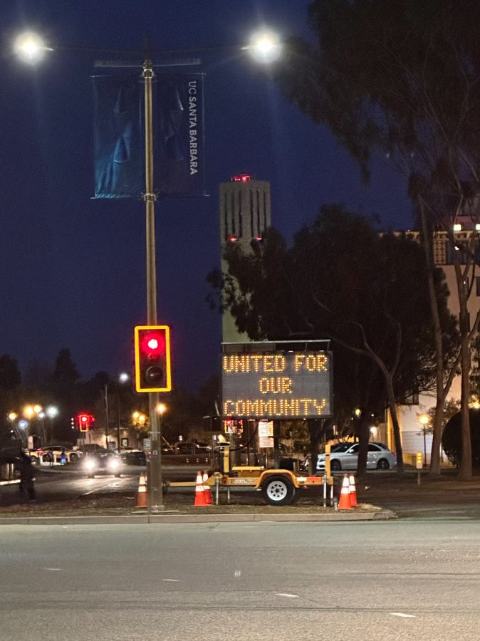 At the intersection of Ocean Rd. and El Colegio Rd. on UCSB campus, a sign reads “United for our Community” in support of Jewish community members in Isla Vista, Calif.
