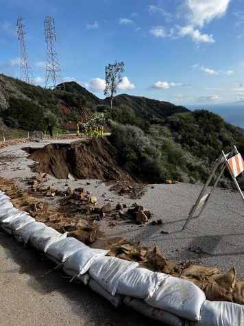 Photograph courtesy of Robby Moore. Another damaged portion of Gibraltar Rd, about 3 miles past the initial failed section, with firefighters in the distance in Santa Barbara, Calif. "They (Cal. Fire) say it's going to take a long time to fix the road and its currently too dangerous to skate with how narrow it's become," 21 year old, Robby Moore said.