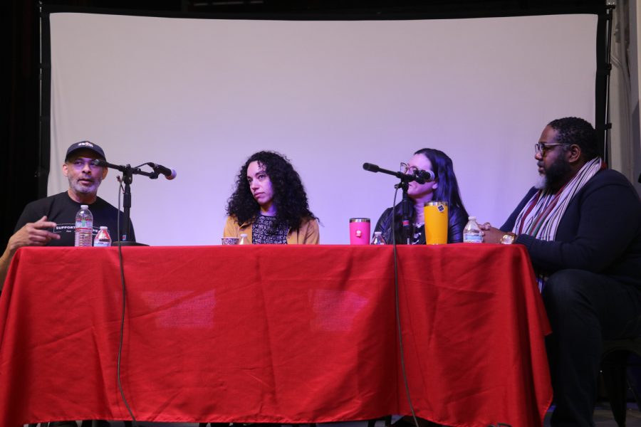 The panelists gaze at Sterling Nix-Bradley as he explains his ambitions with his new downtown restaurant, Soul Bites on Feb. 10 in Santa Barbara, Calif.