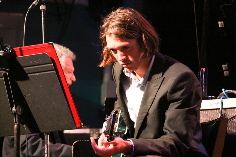 Kayne Hunter gazes at his music charts in the A Combo, New World Jazz Ensemble on Feb. 13 in Santa Barbara, Calif.