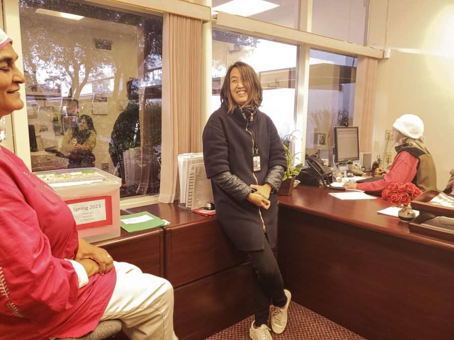 Jeanette Chian Brooks speaks to colleagues in the front office of SBCC's Wake campus in Santa Barbara, Calif. Chian Brooks spends much of her time bonding with and assisting her fellow office staff.