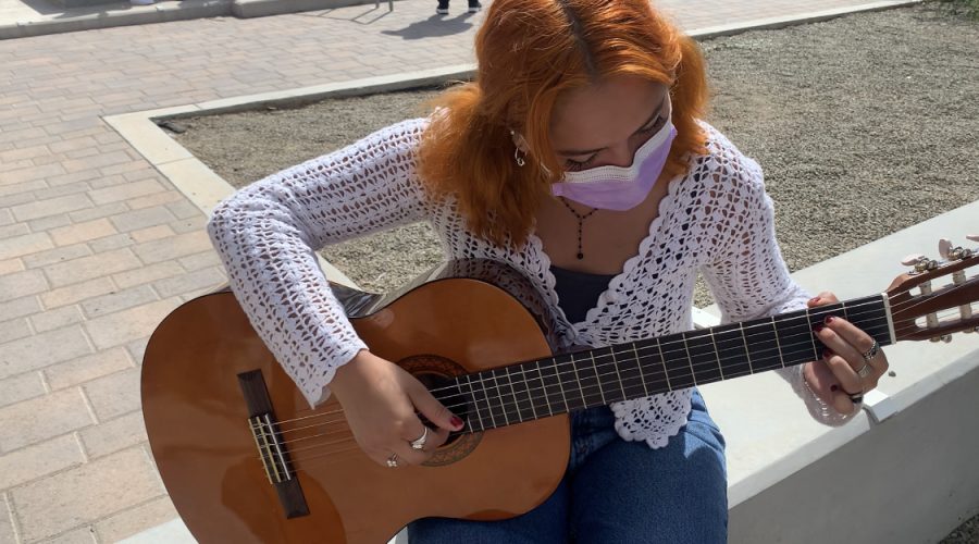 Alexis Chavez playing guitar in November of 2021 in Camarillo, Calif.