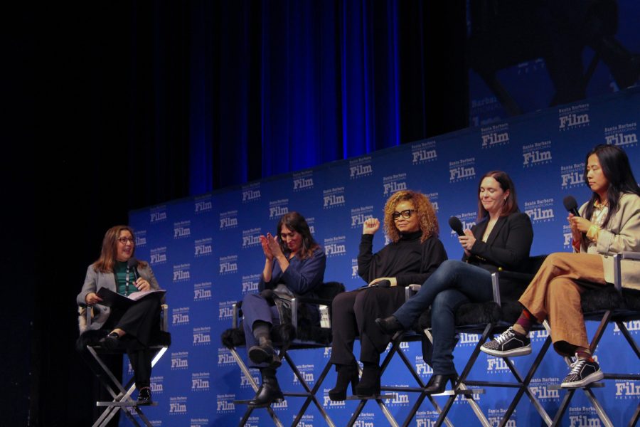 From left to right, festival director Claudia Puig, director of ‘The Martha Mitchell Effect’ Anne Alvergue, costume designer for ‘Black Panther’ Ruth E Carter, producer of ‘The Boy, The Mole, The Fox and The Horse’ Hannah Minghella, director of ‘Turning Red’ and ‘Boa’ Domee Shi applauding Carter as Puig introduced her to the crowd at the Santa Barbara International Film Festivals on Saturday, Feb. 11 in Santa Barbara, Calif.. The audience stretched to the back of the theater as people piled in to listen to the Oscar-nominated women.