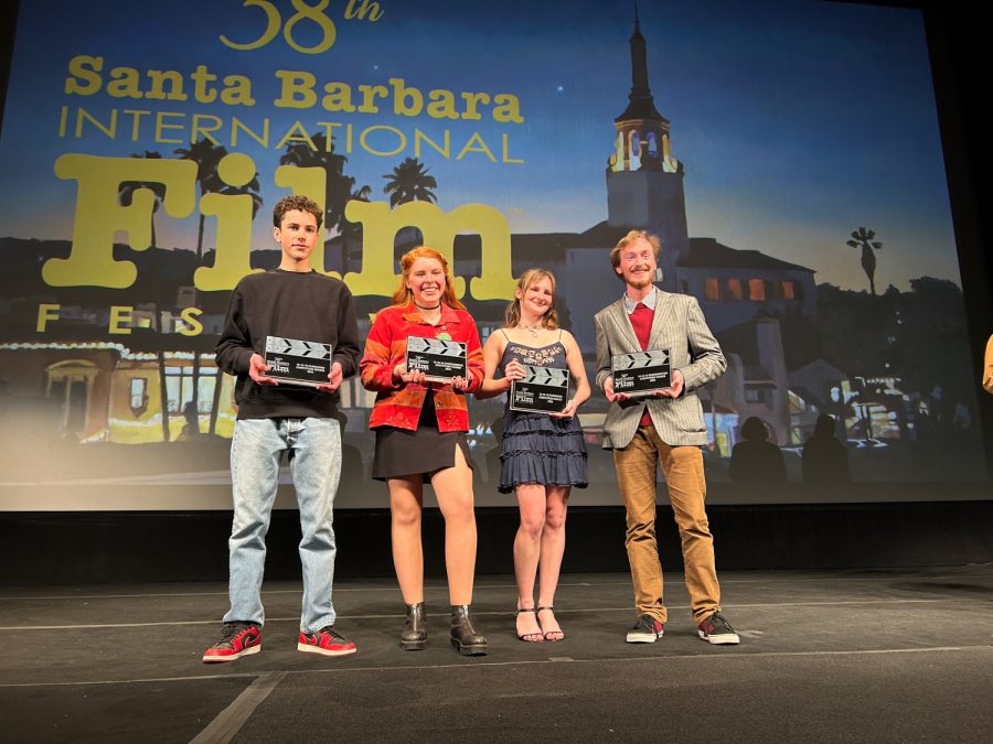 From left, Malcolm Tircuit, Olivia Miller, Lauren Bartling, and Shane Rockenstein Carlson, stand with their awards at the 38th annual Santa Barbara International Film Festival after they presented their student films that they had 5 months to create. The films were all based on the theme of climate change and were presented to the film festival on Saturday, Feb. 18, 2023 at the Granada Theatre in Santa Barbara Calif.
