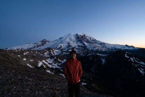 Angel Corzo stands at the end of the Mount Fremont Lookout Trial on July 19, 2022 at Mount Rainier National Park, Wash. Mount Rainier is a stratovolcano, the highest point in the state of Washington.