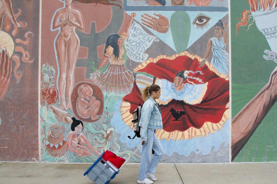 Emilie Beckman, commissioner of international affairs for the Associated Student Government, walks in front of the portion of the Campus Center’s mural dedicated to women on City College’s East Campus in Santa Barbara, Calif. “This month is all about empowering women around the world and continuing the fight for equality, safety, and opportunity for all of us,” Beckman said.