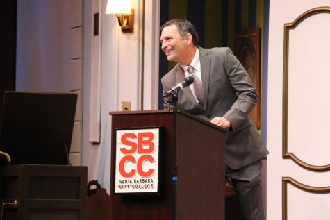 Richard Storti smiles as he approaches the podium for his public forum on March 15 in the Garvin Theatre in Santa Barbara, Calif. Storti is one of three final candidates for superintendent-president of City College.