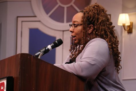 Deneatrice Lewis gazes down at her question sheet during Richard Storti's public forum on March 15 in Santa Barbara, Calif. The Interim Vice President of Human Resources moderated the event in the Garvin Theatre.