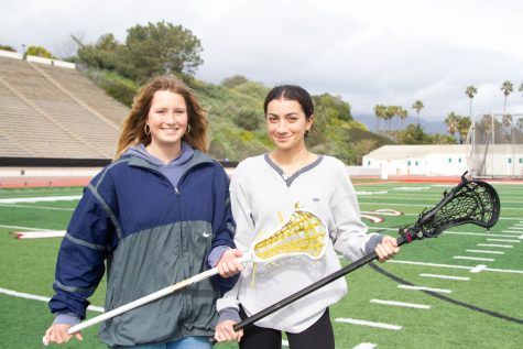 Kia Kofoed (left) and Sabrina Forbes (right) show their competitiveness for the sport of lacrosse in Santa Barbara Calif. The women are City College’s co-captains for the women’s lacrosse team. The two players stand together on Wednesday, March 1.