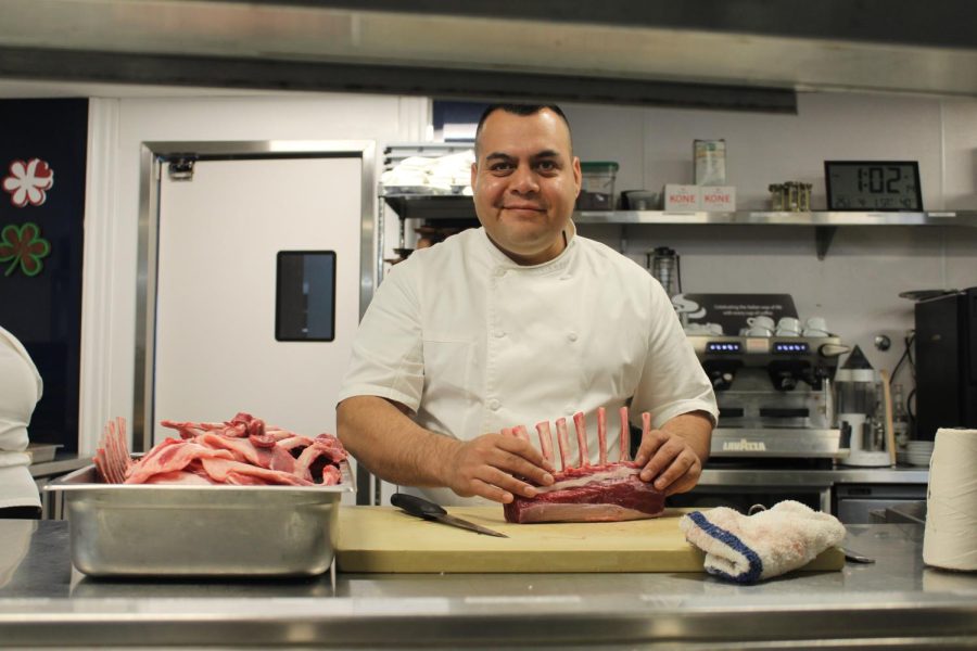 Chef de cuisine Amadeo Rendon stands in his kitchen holding a piece of meat beginning the preparation process. During his four years working at Caruso’s restaurant at Rosewood Miramar Beach, Rendon began as a prep cook and made his way to becoming the chef de cuisine. To do this, Rendon had to master each station in the kitchen. From meat, fish, appetizers and desserts, Rendon has been everywhere in the kitchen. Now, being the chef de cuisine, he oversees the whole kitchen. Rendon began his shift at 11 a.m. and will go home around midnight on Saturday, April 1.
