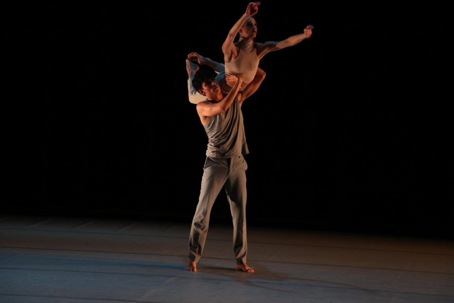 Adrián González lifts Katie Evans during the 2023 Collective dance recital on April 14 at the Garvin Theatre in Santa Barbara, Calif. The duo were paired in multiple pieces in the recital, featuring intricate lifts and movements.