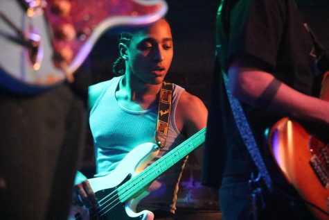 Strange Case bassist Aaron Chapman peers down during the bands' performance at Shabang's Battle of the Bands tour at SOhO on April 15 in Santa Barbara, Calif. The band has previously performed at Shabang in 2022.