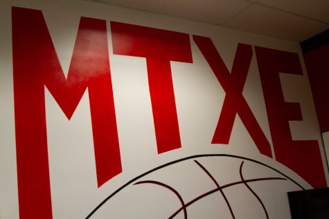 Coach Krul's motto: MTXE, "Mental Toughness, Extra Effort" is painted on her office wall in the Sports Pavilion at City College in Santa Barbara, Calif. Krul's office, on March 22, overlooks the basketball court in the Sports Pavilion, and is full of inspirational messages and quotes.