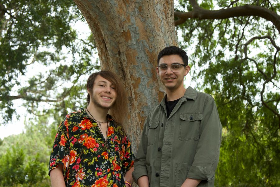 From the left, Ziv Taylor stands next to fellow City College graphic designer, Adrian Rodriguez outside of the Student Services building at City College in Santa Barbara, Calif. Taylor and Rodriguez both designed the logo for the Raíces program at City College.