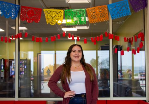 Selena Martinez poses in front of decor surrounding the Center for Equity and Social Justice on City Colleges East Campus on Thursday, April 27 in Santa Barbara, Calif.