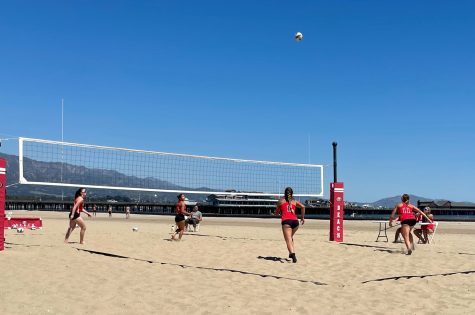Piper Ellbogn-Pettersen (No.11) and Corinne Tommeraason (No.1) against Bakersfield on April 21 on West Beach in Santa Barbara, Calif. The pair is preparing to attack the ball in mid-air.