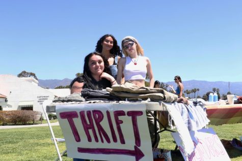 From left, Amanda Reed, Jami Alhady, and Elle Swing host their thrifting booth at the Honors Sustainability Festival on Friday, April 21 in Santa Barbara, Calif. The City College students gathered clothes to sell during the festival, stating that it needed to be done.