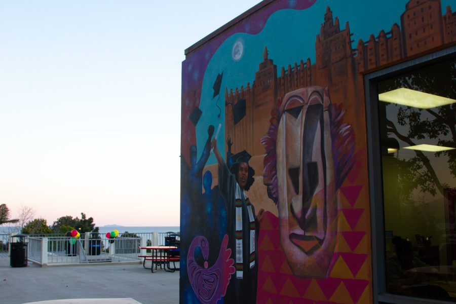 Covering the side of the Umoja Center, a mural was painted by a Bay area nonprofit organization called The Bay Area Mural Program to highlight Black and African American culture. The mural is a representation of excellence among students of color and provides a colorful piece of art to welcome the community to Umoja.