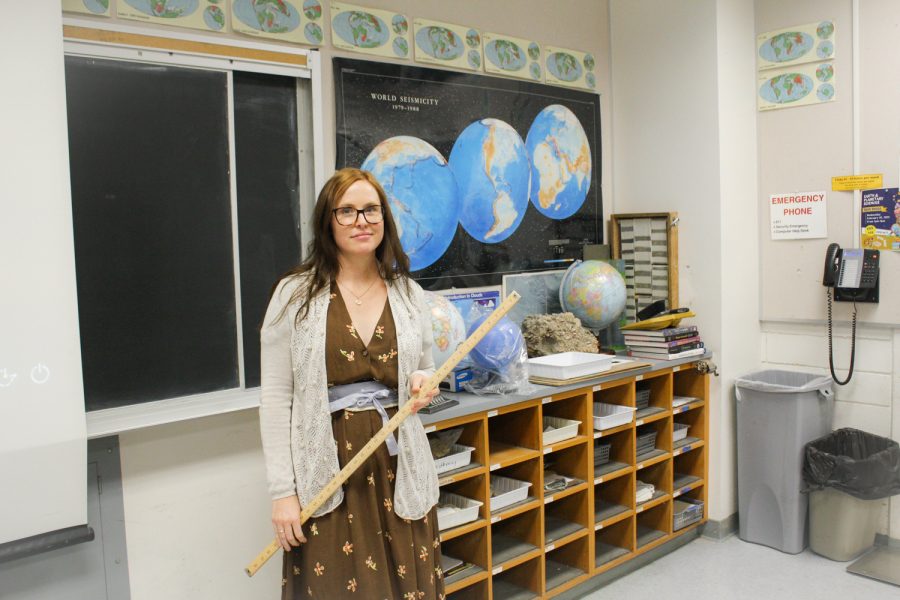 Geordie Armstrong stands in front of the side of the classroom she tends to gravitate most in her lectures on Tuesday, May 9. Armstrong’s classroom is located in the Earth and Biological Sciences building.