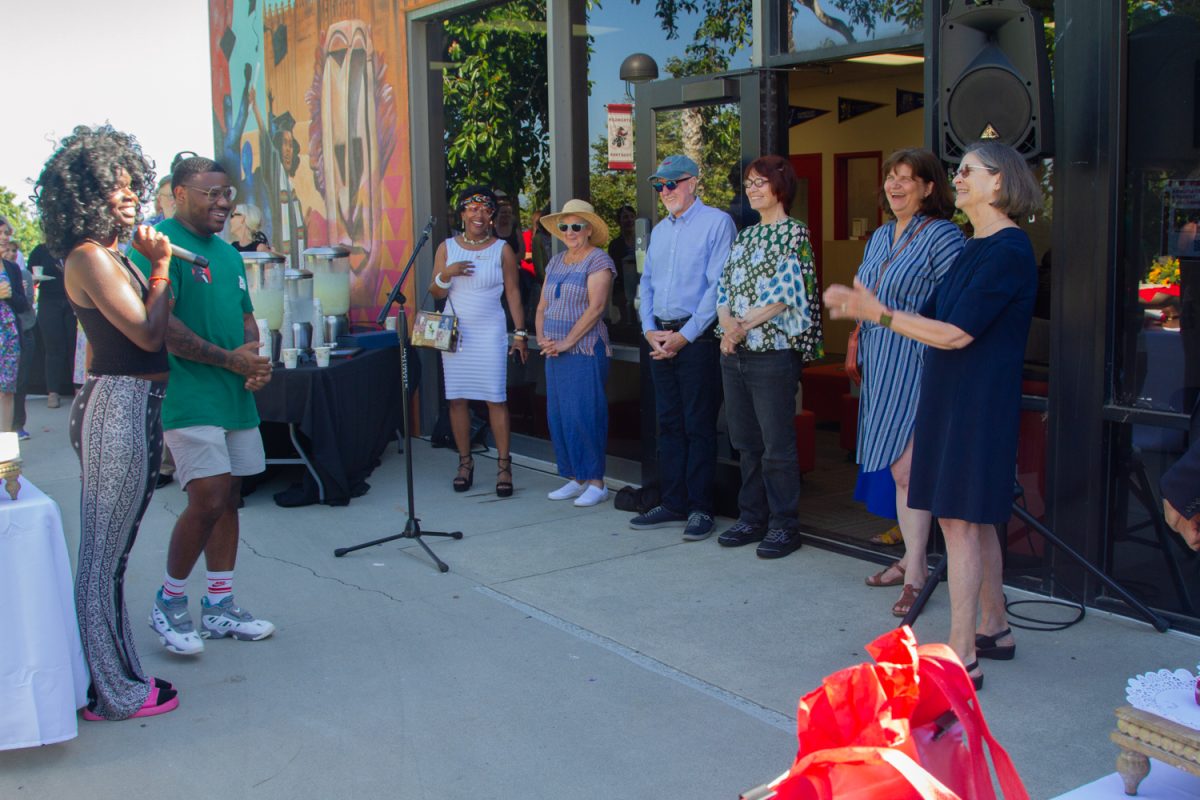 Umoja students (from left) Keenan Kelton and Aida Pouye speak of their gratitude to all that Murillo has done for their program on Aug. 30 at the Campus Center Umoja Mural at City College in Santa Barbara, Calif. The Umoja program serves City College's Black student community. (<a href="https://www.thechannels.org/staff_profile/sofia-stavins/">Sofia Stavins</a>)