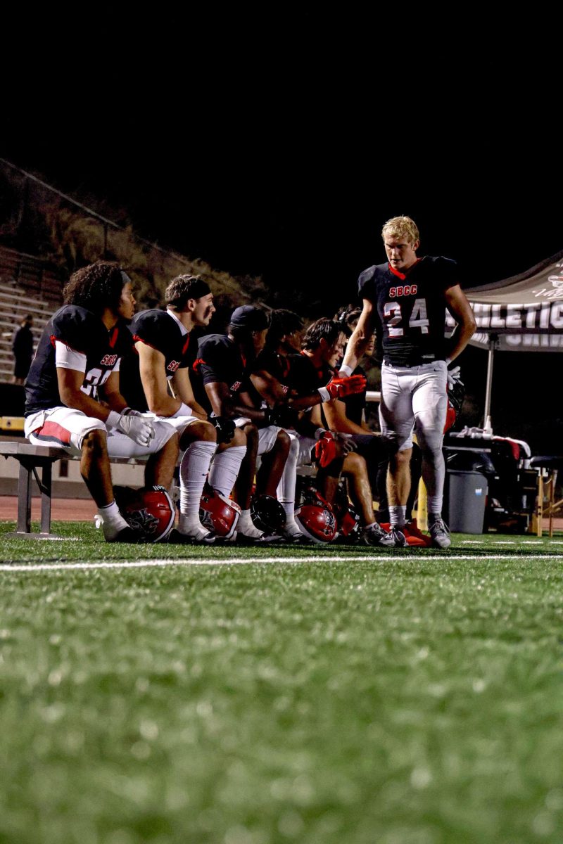 Vaqueros runner back Cameron Woosley shakes the hands of his teammates after SBCCs 24 - 14 loss against the College of the Canyons at La Playa stadium on Saturday, Sept 23 in Santa Barbara, Calif. The Vaqueros now have a 2-2 record this season.