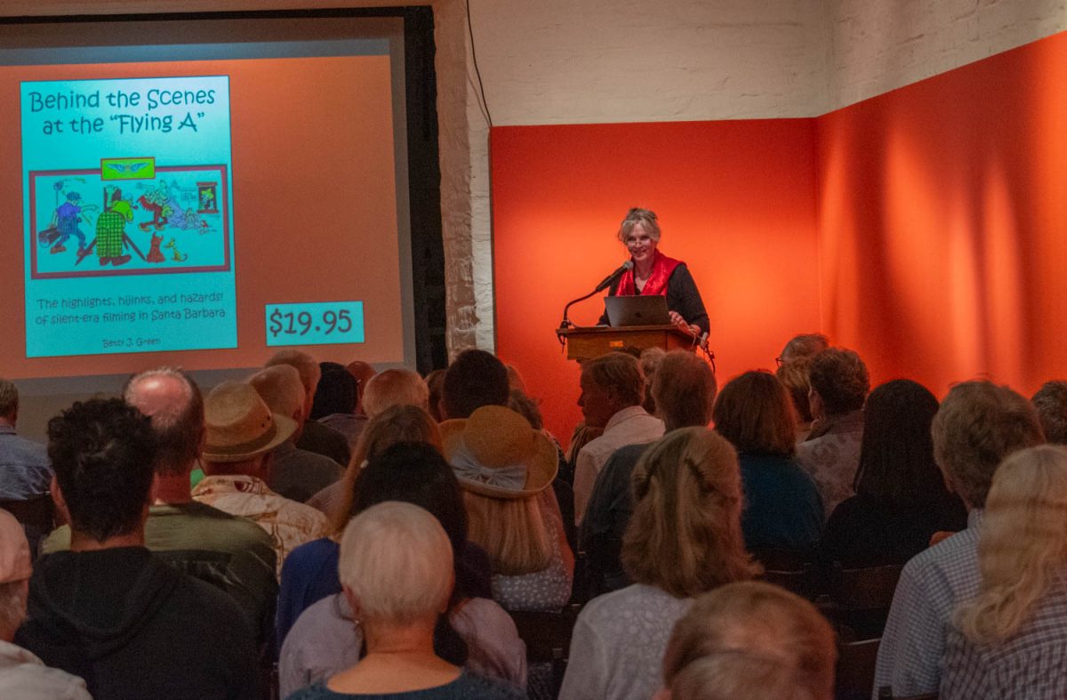 Besty Green, Author of Behind the Scenes at the Flying A. smiles as she thanks the attendees for supporting her newst book. Green shares photos and stories for her book on Sept. 27 at the Santa Barbara Historical Museum in Santa Barbara, Calif. 