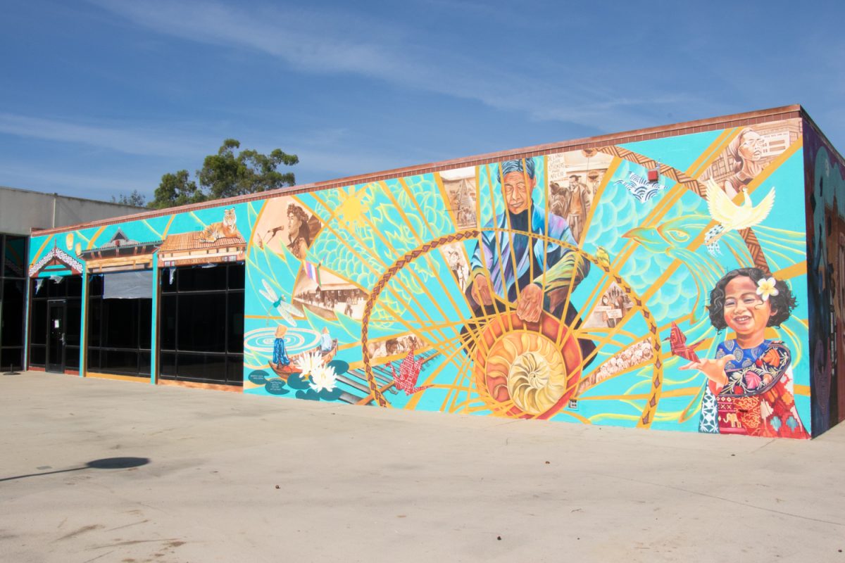 The mural celebrating Asian American and Pacific Islander culture gleams in the sunshine outside of City College's Campus Center in Santa Barbara, Calif. The mural was a collaboration between the AAPI+ community on City College campus, and the Twin Walls Mural Company based in California's Bay Area.