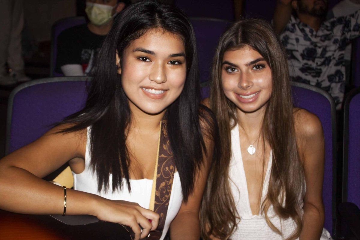 From left, Gigi Dyche and Jasmine Barba wait in anticipation of the honors program mic night of the Fall semester on Sept. 28 at City College in Santa Barbara, Calif. The event took place in the BC Forum on the West Campus where free pizza was served for students who attended.