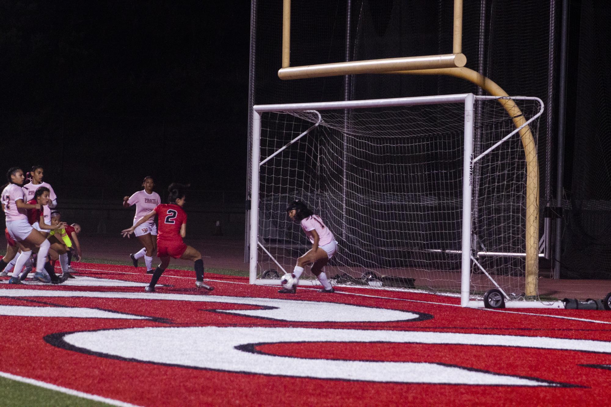 The first Vaqueros goal of the evening is a team goal, which gave the team a 1-0 lead at La Playa Stadium on Oct. 25, 2023. Ventura College goalkeeper, Isa Garcia, is seen away from the net in this Western State Conference local rivalry against the Ventura College Pirates.