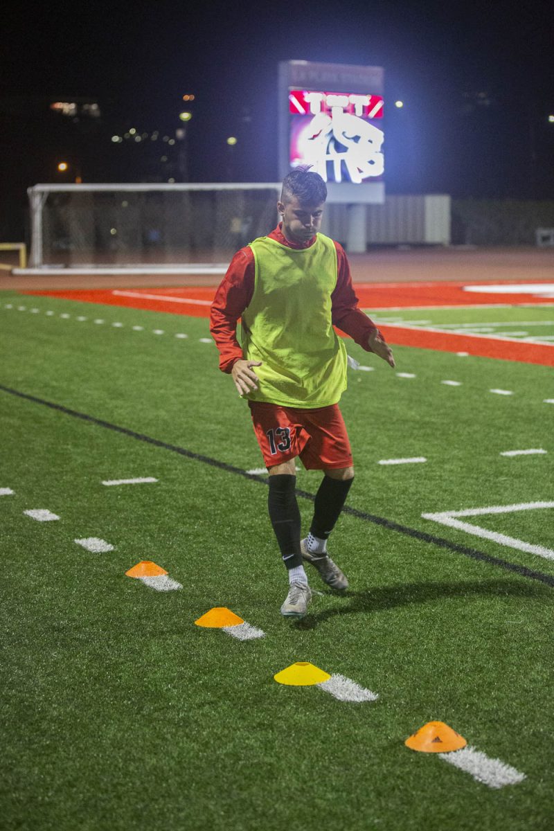 Tyler Wise warms up in order to be ready as a substitute if needed in the game on Oct 16 at La Playa Stadium in Santa Barbara, Calif. The Queensland, Australia, native plays an offensive position.
