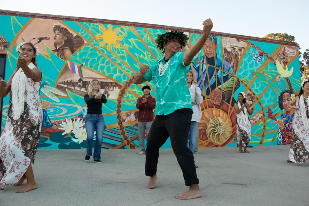 Marc Nicolas invites the crowd to participate during the AAPI+ mural celebration with Hula Anyone on Oct. 13 in Santa Barbara, Calif. As the Hula Anyone dancers guided the audience through the routine, the participants slowly got the hang of the traditional dances.
