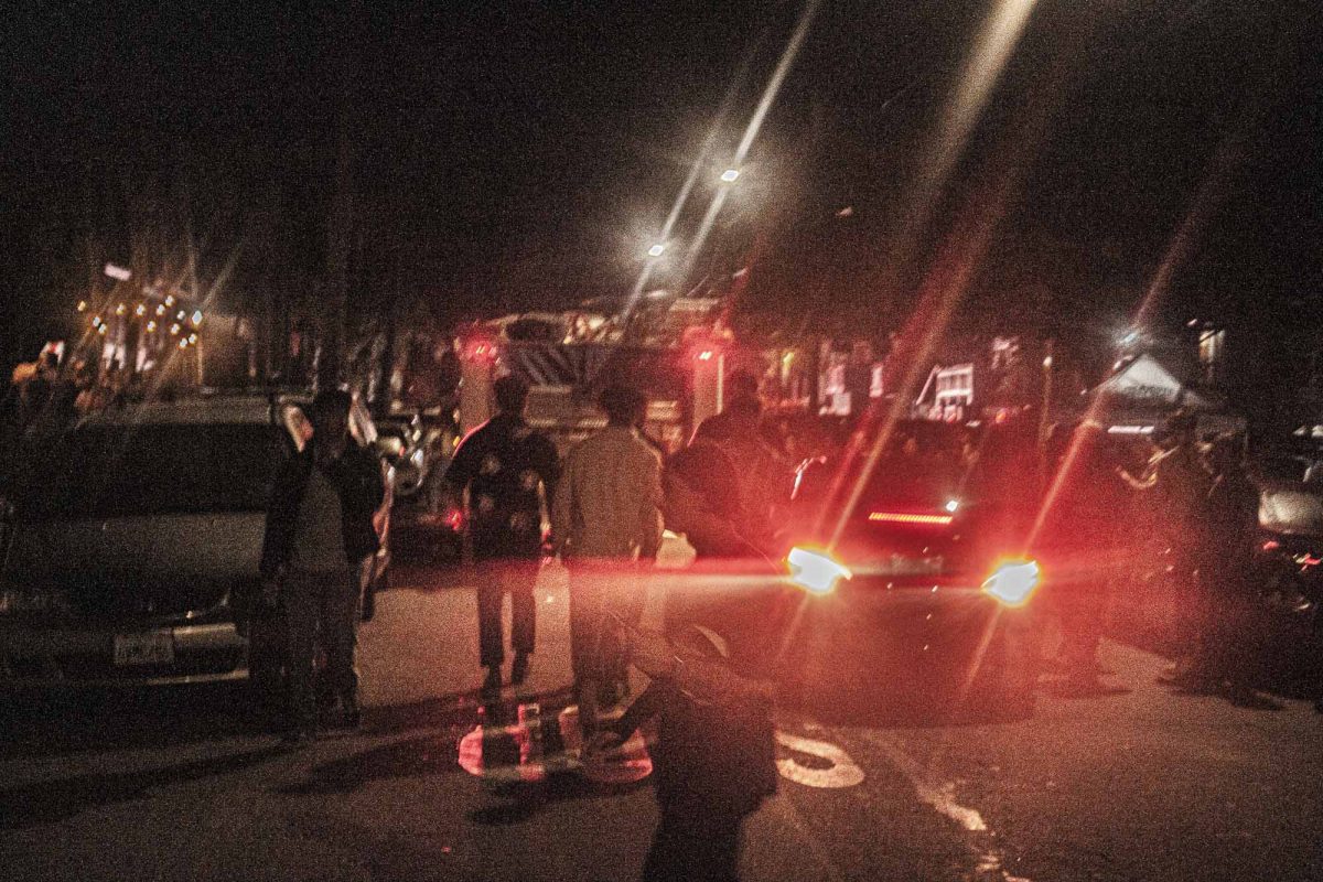 A fire truck and automobiles light up Del Playa drive on Friday, October 13th in Isla Vista, Calif. Students kicked off the Halloween season filling the streets of Isla Vista weeks before the day arrives.