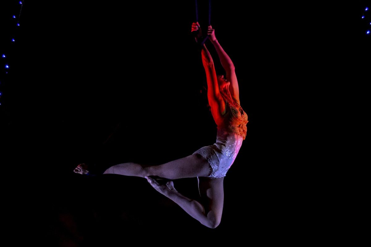 Cindy Walker Macy levitates during the Seance performance and Victorian Masquerade presented by Music of Ghost on Nov. 4, 2023 at the SBCAST creative space in Santa Barbara, Calif. Aerial silk acrobatics are a creative and gravity defying performance using nylon fabric.