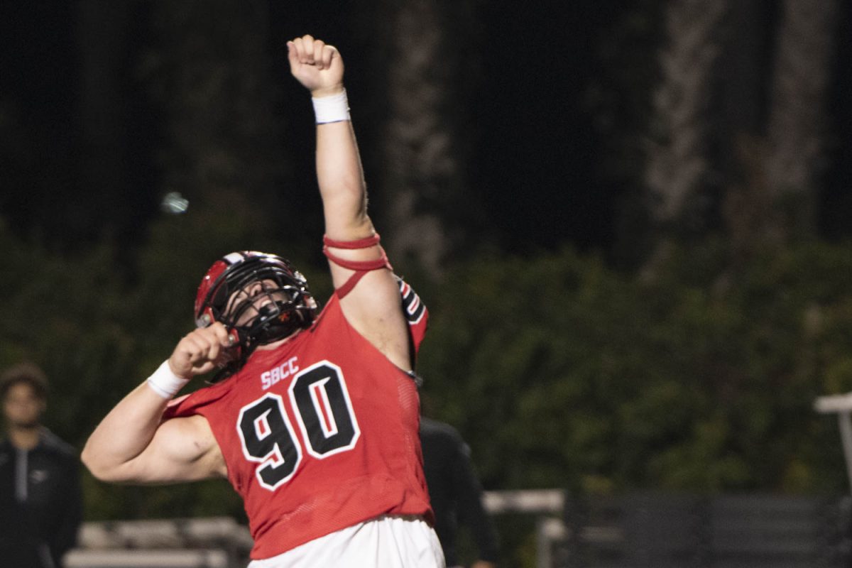 Grant Hessler celebrates after he sacks the Raiders quarterback at La Playa Stadium in Santa Barbara, Calif. Hessler sacked Raider quarterback twice during the game on Nov. 4.