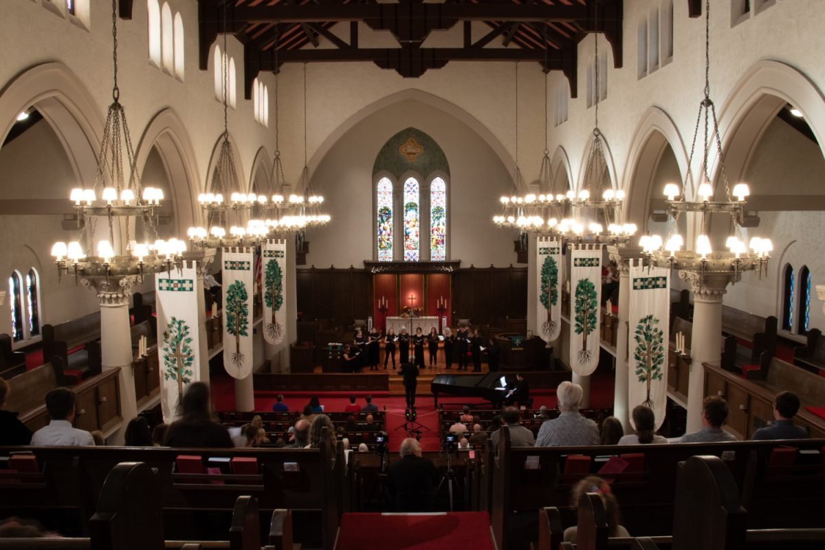 The SBCC Chamber Singers preform their final piece with Season of Light by Jacob Narverud during the Winter Choral Concert at the First United Methodist Church on Nov. 19 in Santa Barbara, Calif. Due to the acoustics and setting of the church, SBCC has held many performances at the venue. (Claire Geriak)