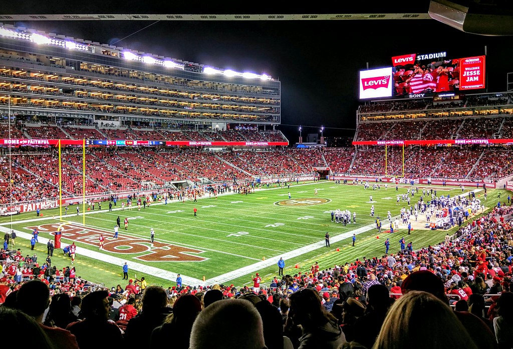 49ers fans fill the stands in San Franciscos Levis Stadium. The NFL team entertains thousands both in person and over the television.