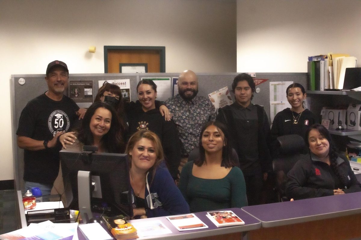 The Extended Opportunities Programs and Services Staff is all smiles at the front desk office, Nov. 21. The EOPS program helps to assist students challenged by language, economic, and educational disadvantages.