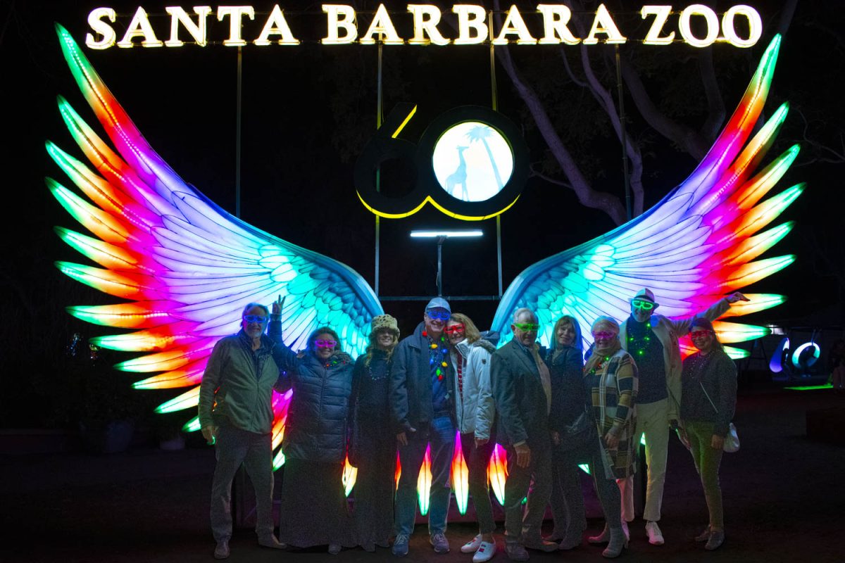 Santa Barbara District Attorney John Savrnoch (4th from the left) poses with love ones on Dec. 1, in Santa Barbara, Calif. Savrnoch celebrates his birthday at the Santa Barbara Zoo Lights.