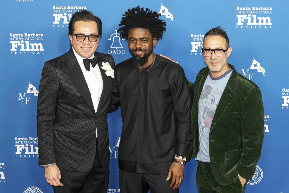From Left, Roger Durling, Joel Kachi Benson, and Matthew Ogens gleam together on Feb. 7 on the red carpet for the premire of Madu at the Arlington Theater in Santa Barbara, Calif. Santa Barbara has hosted the International Film Festival for 39 straight years, begining in 1986.