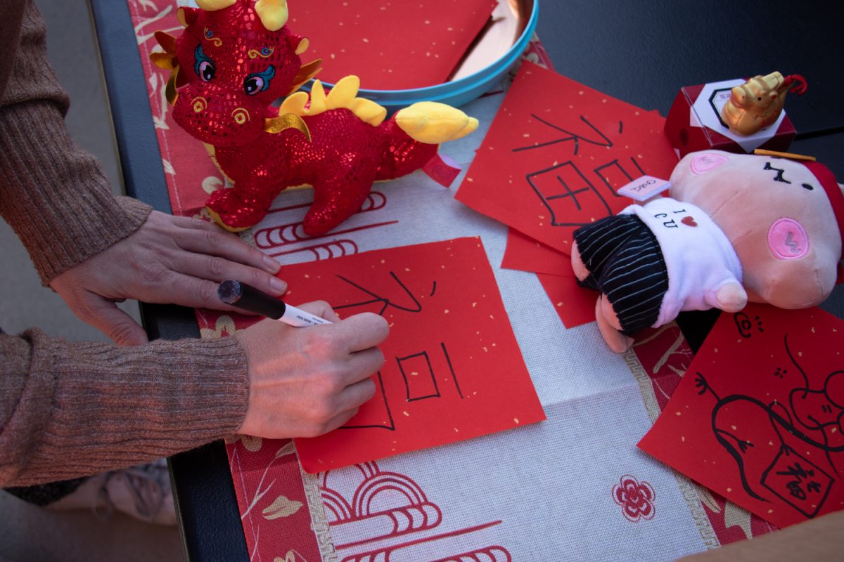 As a puzzle, the Chinese and Asian Student Unions had visitors of the Lunar New Year celebration try to copy Chinese characters on Feb. 15 in Santa Barbara, Calif. With support from the ASU and CSU, the prize for the puzzle was a red envelope with stickers, candy, and other items inside. 
