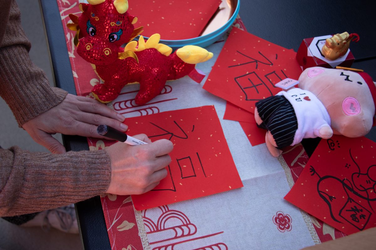As a puzzle, the Chinese and Asian Student Unions had visitors of the Lunar New Year celebration try to copy Chinese characters on Feb. 15 in Santa Barbara, Calif. With support from the ASU and CSU, the prize for the puzzle was a red envelope with stickers, candy, and other items inside. 