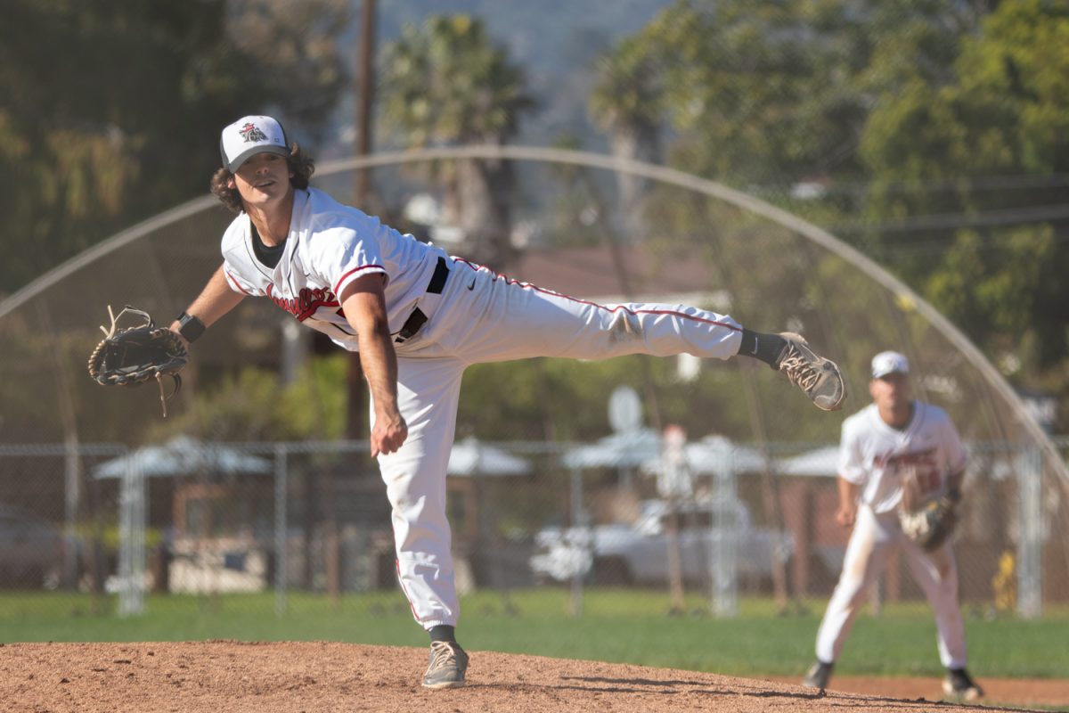 Jake Villar pitches to the Ventura College Pirates on March 12 at Pershing Park in Santa Barbara, Calif. Villar contributed to the win for the Vaqueros during the game, with the final score ending 10-4.