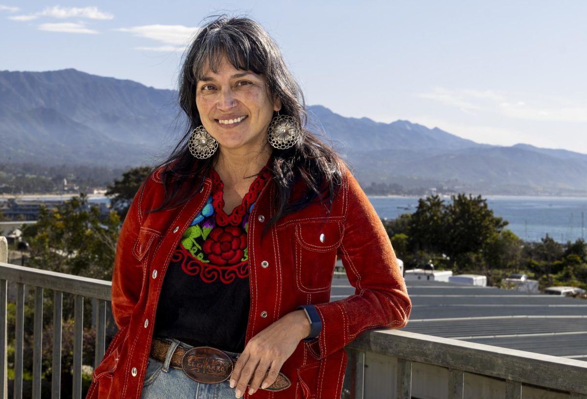 Melissa Menendez flaunts on East Campus on March 15, 2024 at City College in Santa Barbara, Calif. Menendez recently won the Hayward Award, honoring her excellence as part of the City College faculty.