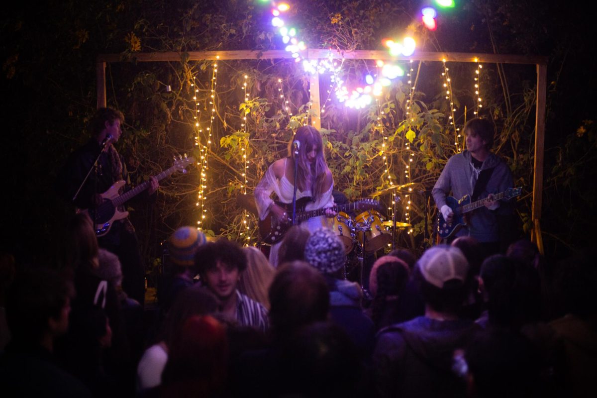 Orangepit rock out on Dec. 9 in Isla Vista, Calif. The band primary preforms original songs written by Carmen Warder, lead singer and guitarist accompanied by Toby Still on bass guitar, Kayne Hunter on electric guitar and drummer Lucas Herzog. Photo courtesy of Dalton Beeler.