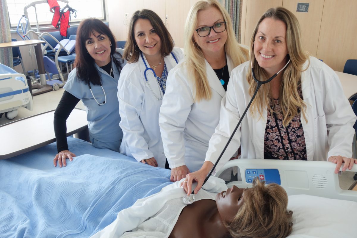 The City College nursing faculty assess a training manikin on May 2 at the Nursing Lab at City College in Santa Barbara, Calif. In fall 2023, every student who graduated with an associate degree in nursing at City College passed the state board exams and are officially registered nurses.